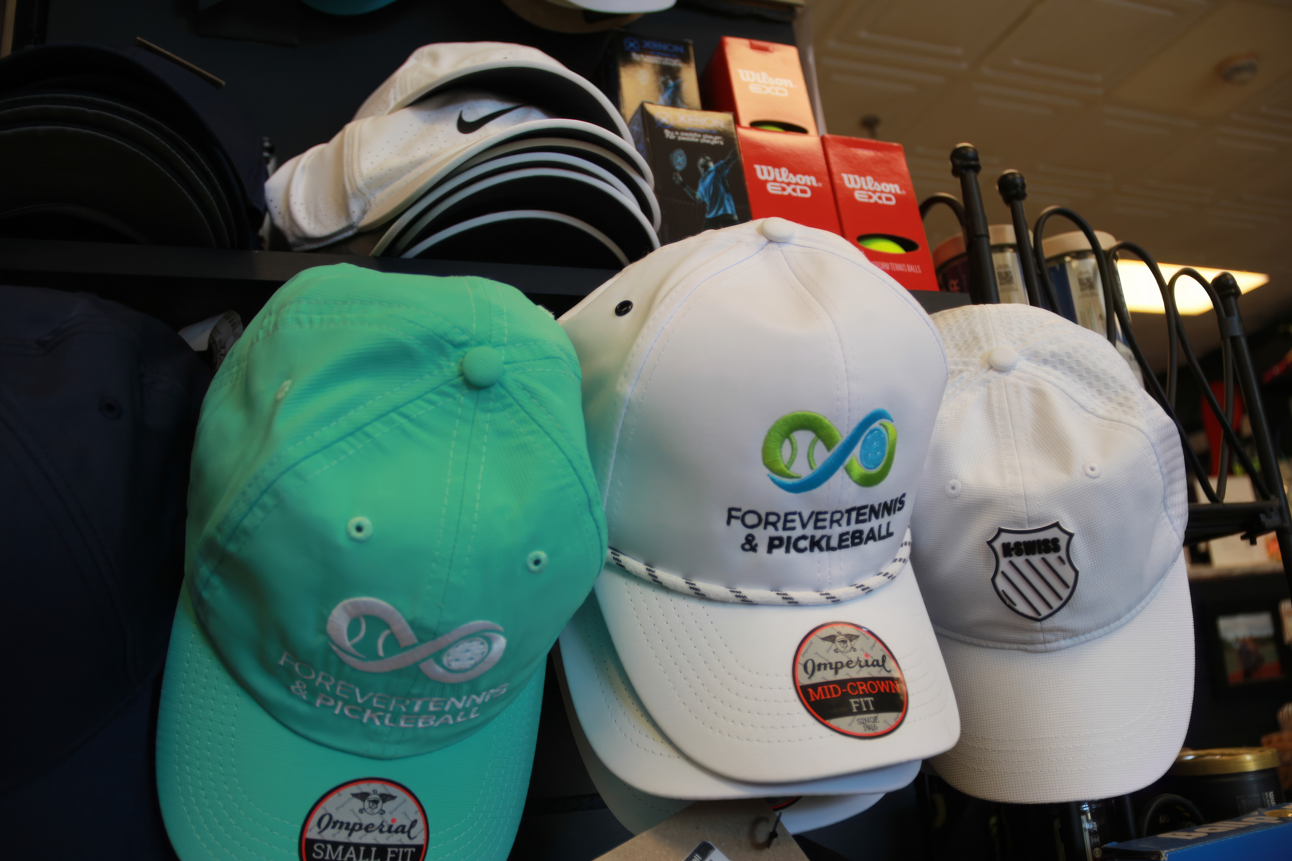 Forever Tennis branded hats