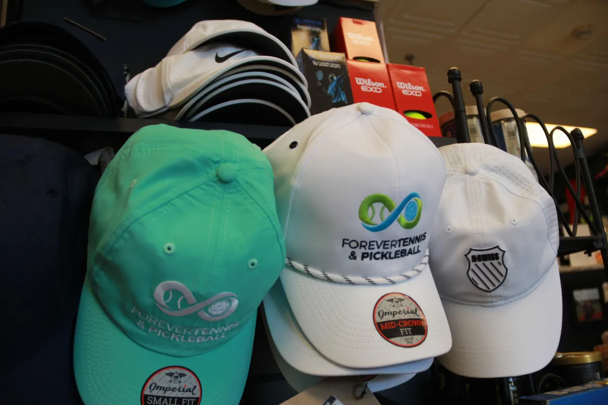Forever Tennis branded hats