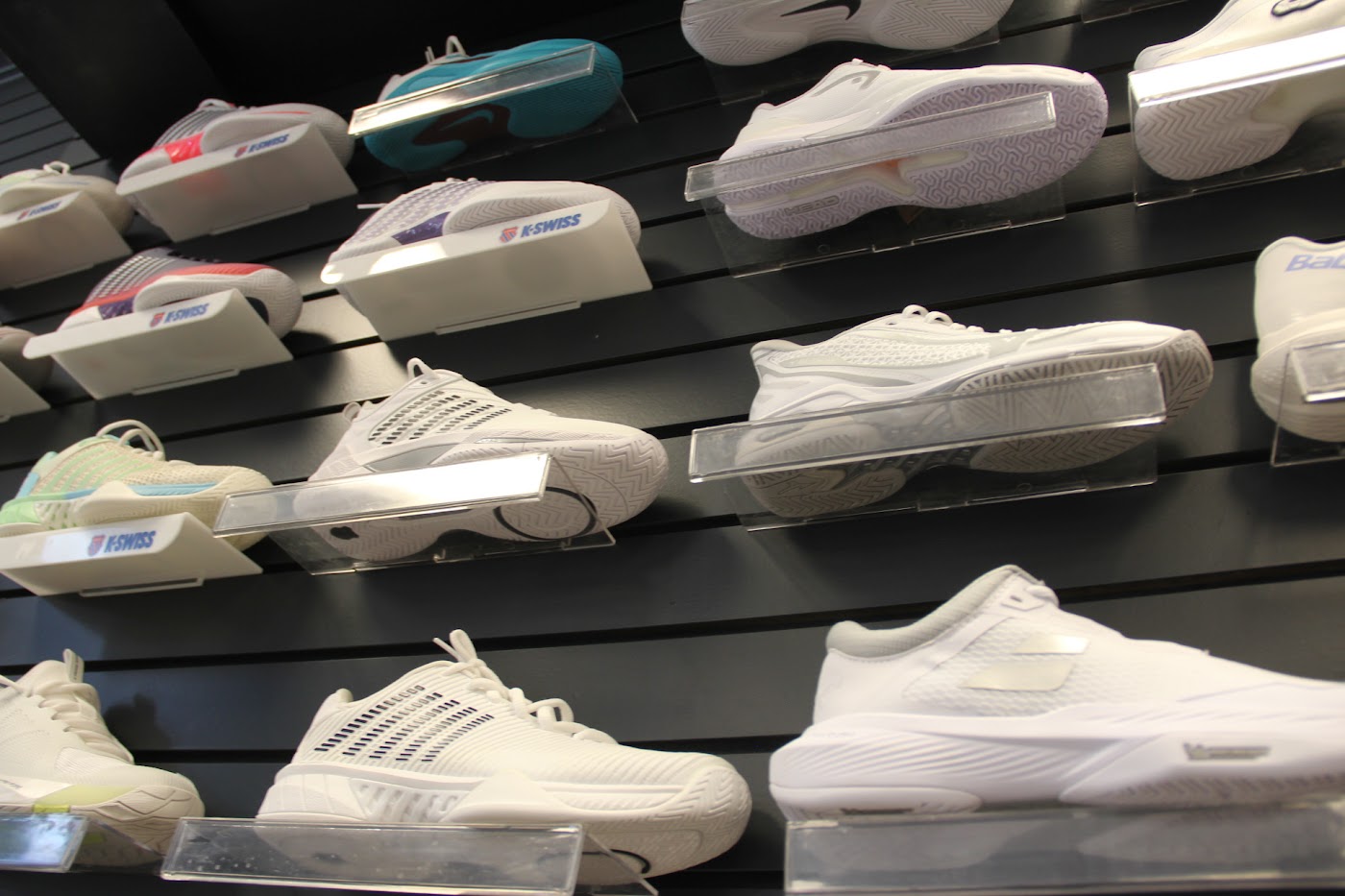Close-up of a pair of court shoes at Forever Tennis.