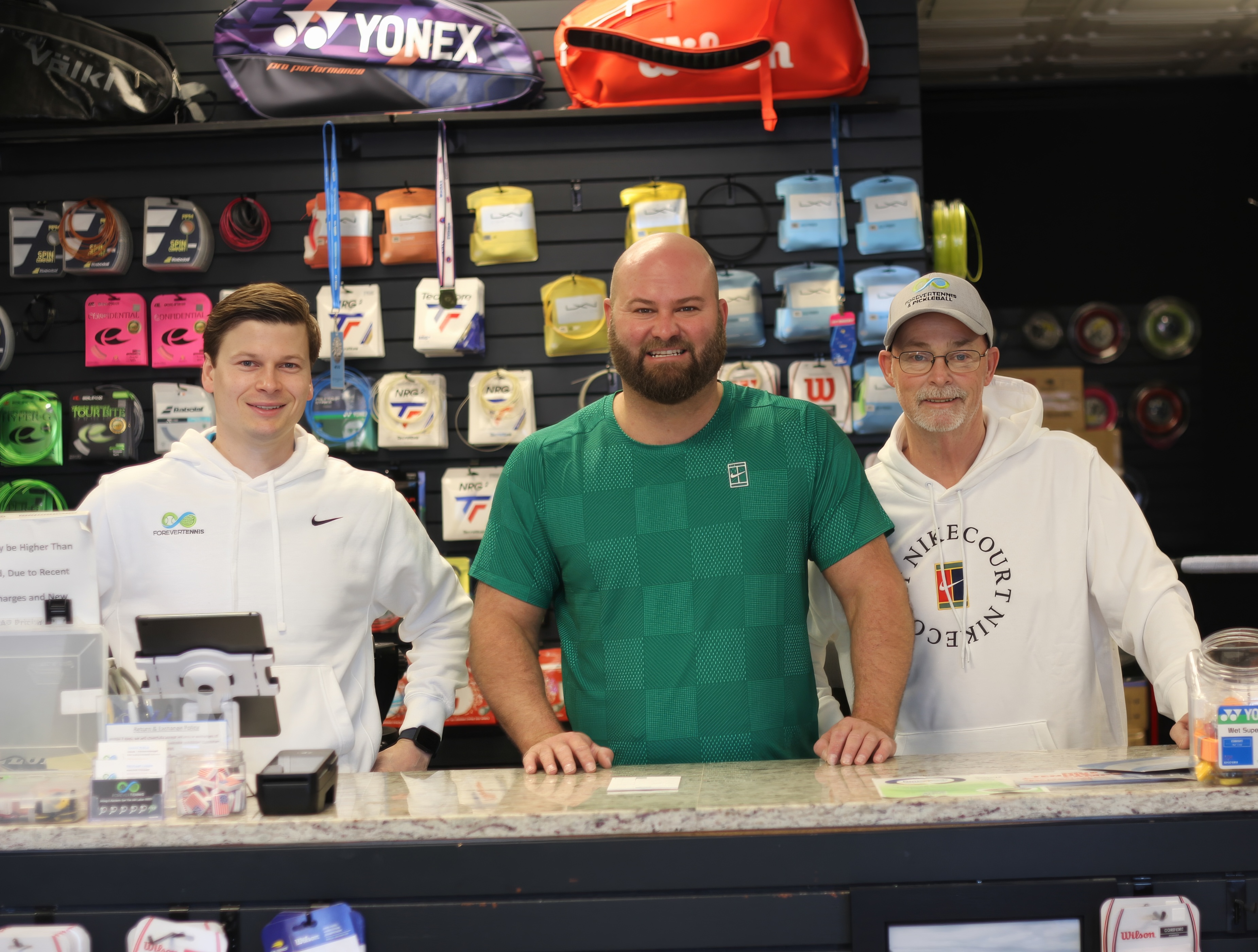 Forever Tennis staff in the pro shop